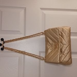 Badgley Mischka gold purse with heavy goldtone chain strap